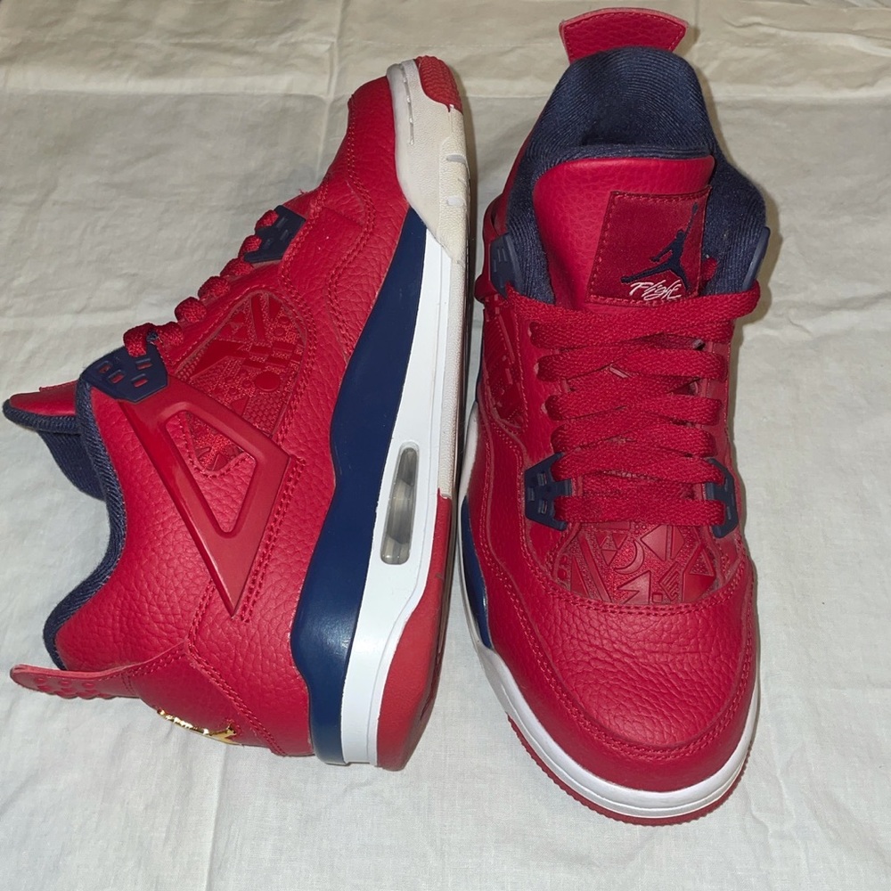 red and navy jordan 4s